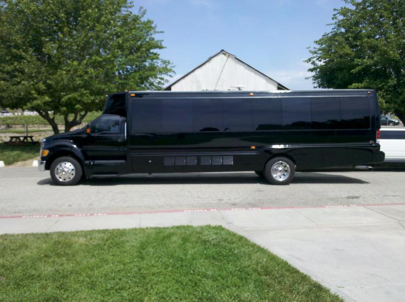 Shuttle Bus Limo by Coachman Enterprises Limo Service